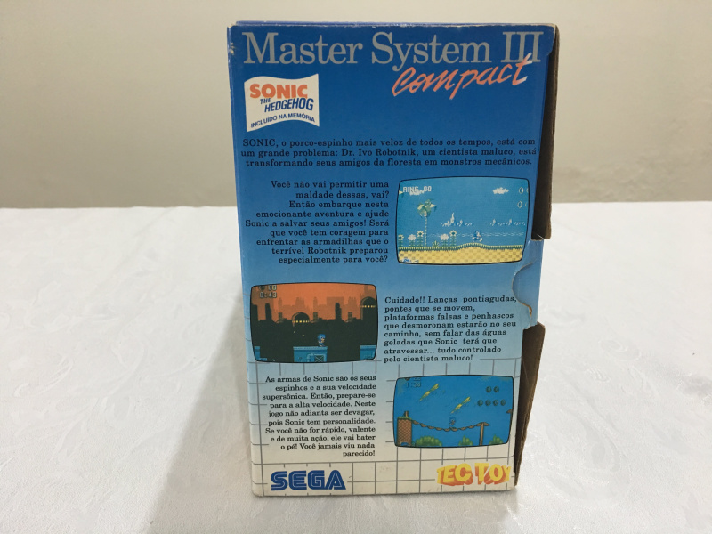 Arquivo:MasterSystem3CompactcomSonicCaixaAzuleBrancaeSeloInmetro 06.jpg