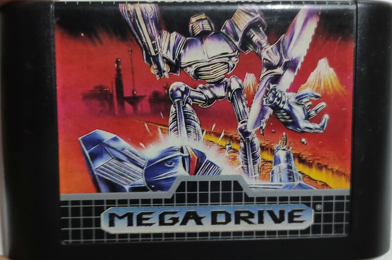 Arquivo:MDCartCyborgJustice f.jpg